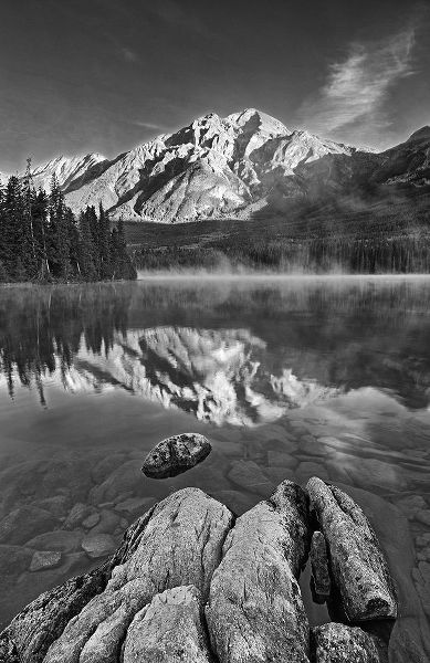 Canada-Alberta-Jasper National Park Pyramid Mountain reflected in Pyramid Lake at sunrise